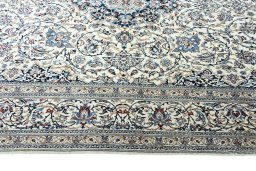 Corner detail of 2000s Nain rug showing border pattern and Cork pile