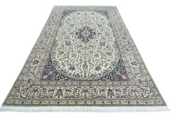 Surface texture of 2000s Nain rug with natural Cork and intricate pattern
