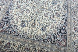 Close-up detail of 2000s Nain rug from Iran / Persia showing Cork weave