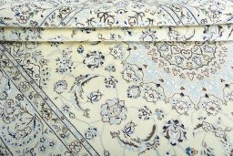 Close-up detail of New Nain rug from Iran / Persia showing Wool weave