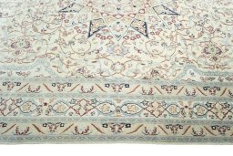 Corner detail of 2000s Nain rug showing border pattern and Wool pile