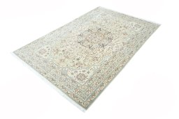 Corner detail of 2000s Nain rug showing border pattern and Wool pile