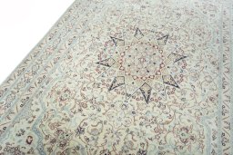 Backside of handmade 2000s Nain rug showing knot structure and weave density