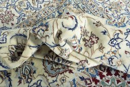 Surface texture of New Nain rug with natural Silk and intricate pattern
