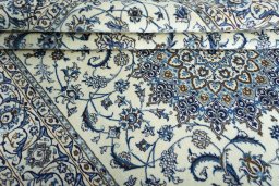 Close-up detail of New Nain rug from Iran / Persia showing Wool weave