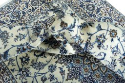 Surface texture of New Nain rug with natural Wool and intricate pattern