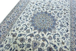 Backside of handmade New Nain rug showing knot structure and weave density
