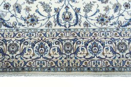 Full view of New Nain rug from Iran / Persia, 303 × 197 cm in Beige tones