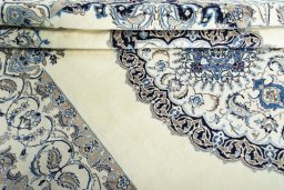 Close-up detail of New Nain rug from Iran / Persia showing Wool weave
