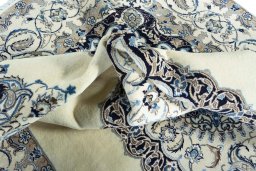 Surface texture of New Nain rug with natural Wool and intricate pattern