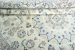 Close-up detail of New Nain rug from Iran / Persia showing Wool weave