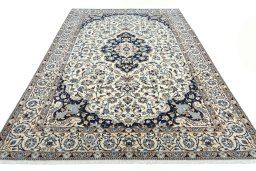 Surface texture of New Nain rug with natural Wool and intricate pattern
