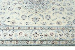 Corner detail of New Nain rug showing border pattern and Wool pile
