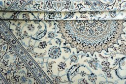 Close-up detail of New Nain rug from Iran / Persia showing Wool weave