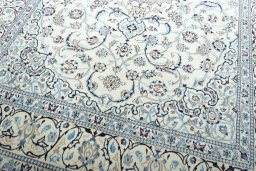 Close-up detail of New Nain rug from Iran / Persia showing Wool weave