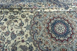 Close-up detail of 2000s Nain rug from Iran / Persia showing Cork weave