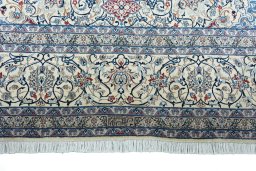 Full view of 2000s Nain rug from Iran / Persia, 389 × 262 cm in Beige tones