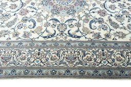 Corner detail of New Nain rug showing border pattern and Wool pile
