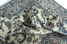 Surface texture of New Nain rug with natural Wool and intricate pattern
