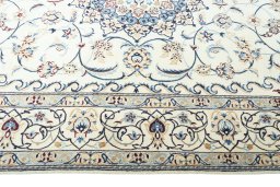 Corner detail of New Nain rug showing border pattern and Wool pile