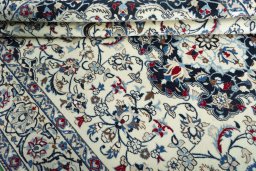 Close-up detail of New Nain rug from Iran / Persia showing Wool weave