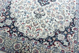 Close-up detail of New Nain rug from Iran / Persia showing Wool weave