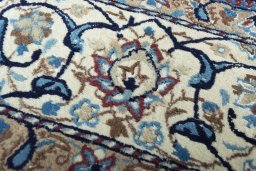 Close-up detail of 2000s Nain rug from Iran / Persia showing Wool weave
