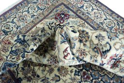 Surface texture of 2000s Nain rug with natural Wool and intricate pattern