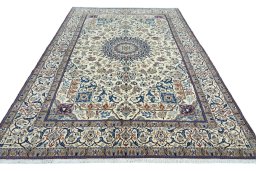 Surface texture of 2000s Nain rug with natural Wool and intricate pattern