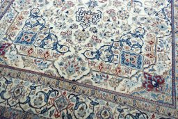 Close-up detail of 2000s Nain rug from Iran / Persia showing Wool weave