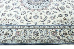 Corner detail of New Nain rug showing border pattern and Wool pile