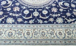 Corner detail of New Nain rug showing border pattern and Cork pile