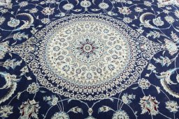 Central medallion detail of New Nain rug from Iran / Persia