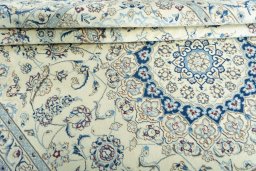 Close-up detail of New Nain rug from Iran / Persia showing Wool weave