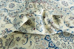 Surface texture of New Nain rug with natural Wool and intricate pattern