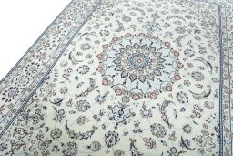 Backside of handmade 2000s Nain rug showing knot structure and weave density