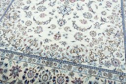 Close-up detail of 2000s Nain rug from Iran / Persia showing Wool weave