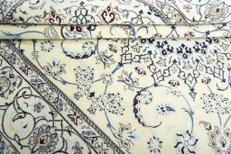 Close-up detail of New Nain rug from Iran / Persia showing Wool weave