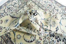 Surface texture of New Nain rug with natural Wool and intricate pattern