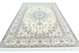 Surface texture of New Nain rug with natural Wool and intricate pattern