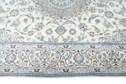 Corner detail of New Nain rug showing border pattern and Wool pile
