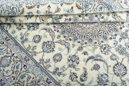 Close-up detail of New Nain rug from Iran / Persia showing Wool weave