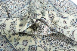 Surface texture of New Nain rug with natural Wool and intricate pattern