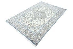 Corner detail of New Nain rug showing border pattern and Wool pile