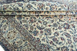 Close-up detail of 2000s Nain rug from Iran / Persia showing Wool weave