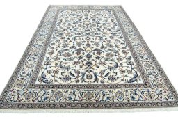 Surface texture of 2000s Nain rug with natural Wool and intricate pattern