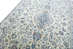 Backside of handmade 2000s Nain rug showing knot structure and weave density