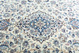 Central medallion detail of 2000s Nain rug from Iran / Persia