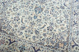 Close-up detail of 2000s Nain rug from Iran / Persia showing Wool weave