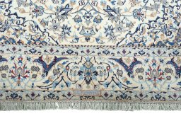 Full view of 2000s Nain rug from Iran / Persia, 317 × 204 cm in Beige tones